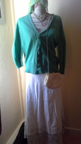 Here Chantelle my favourite mannequin models my outfit for the occasion.   I didn’t want to spend a whole heap of money on buying vintage 50s clothes for the occasion, so I improvised by sewing a petticoat into an old skirt and teaming it with a little cardi.  The pearls were the only genuine 1950s thing.    