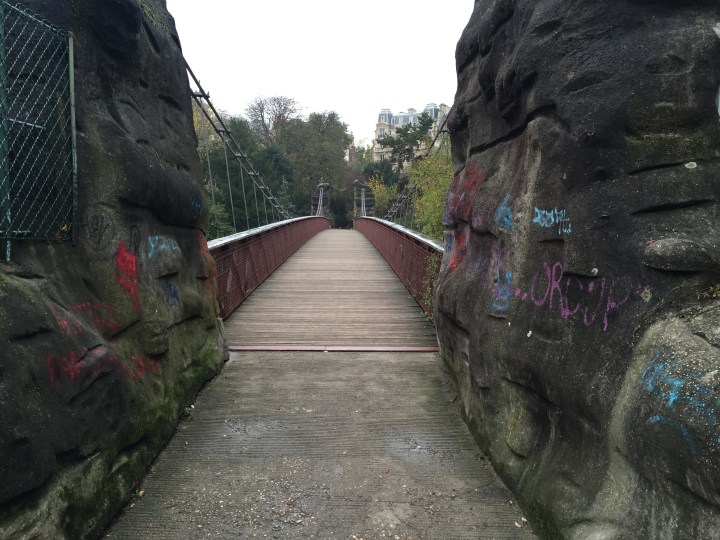Bridge across the artificial lake in Parc des Buttes Chaumont