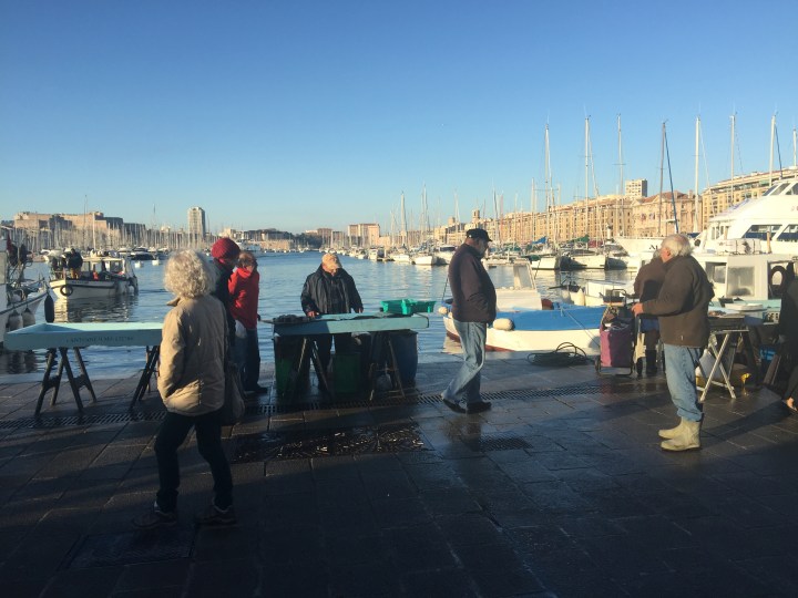 Selling the day's catch down by the old port.