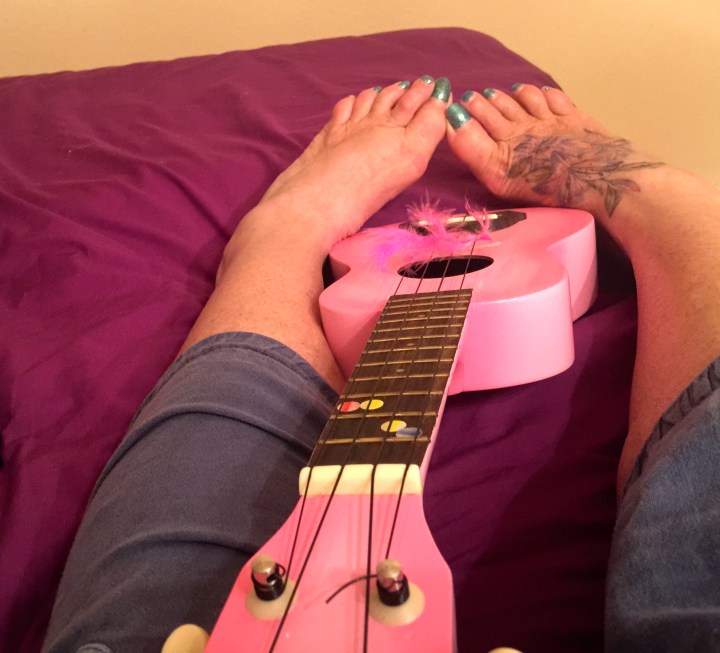 Hanging out with my uke.  Teacher won't let me into the next class up until I prove I have mastered the Tom Jones' classic Delilah. So I have spent the entire week contorting my hand into the impossible Bb chord which will allow me to prove my prowess with that song.  I now hear it in my sleep.    